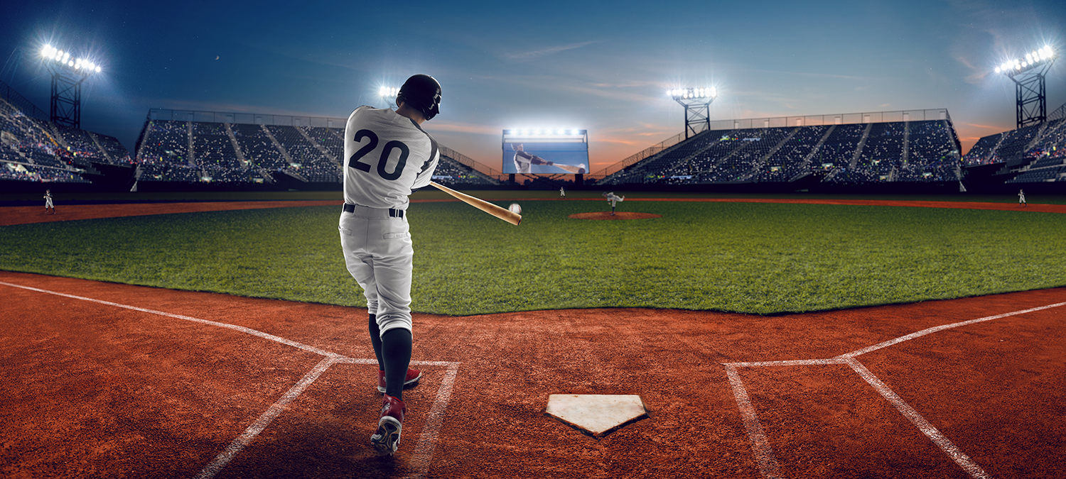 Stylistic image of a baseball player hitting a ball at a baseball stadium