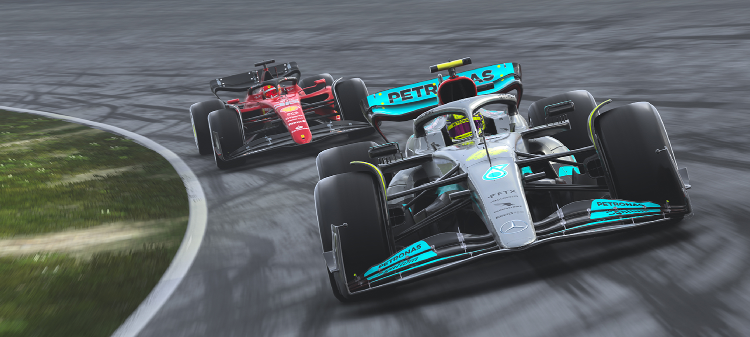 Two Formula 1 (F1) race cars making a turn.