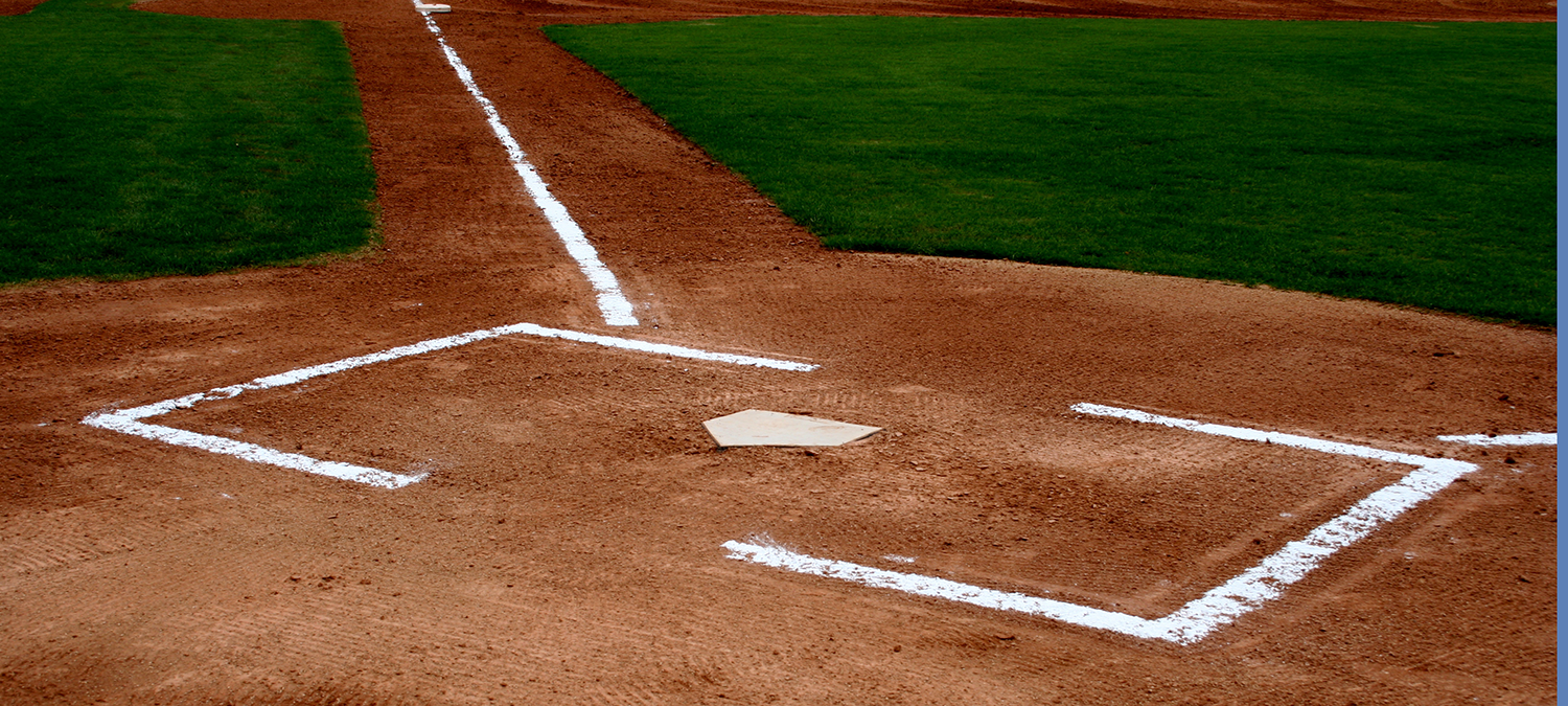 Angled shot of home plate on a baseball field