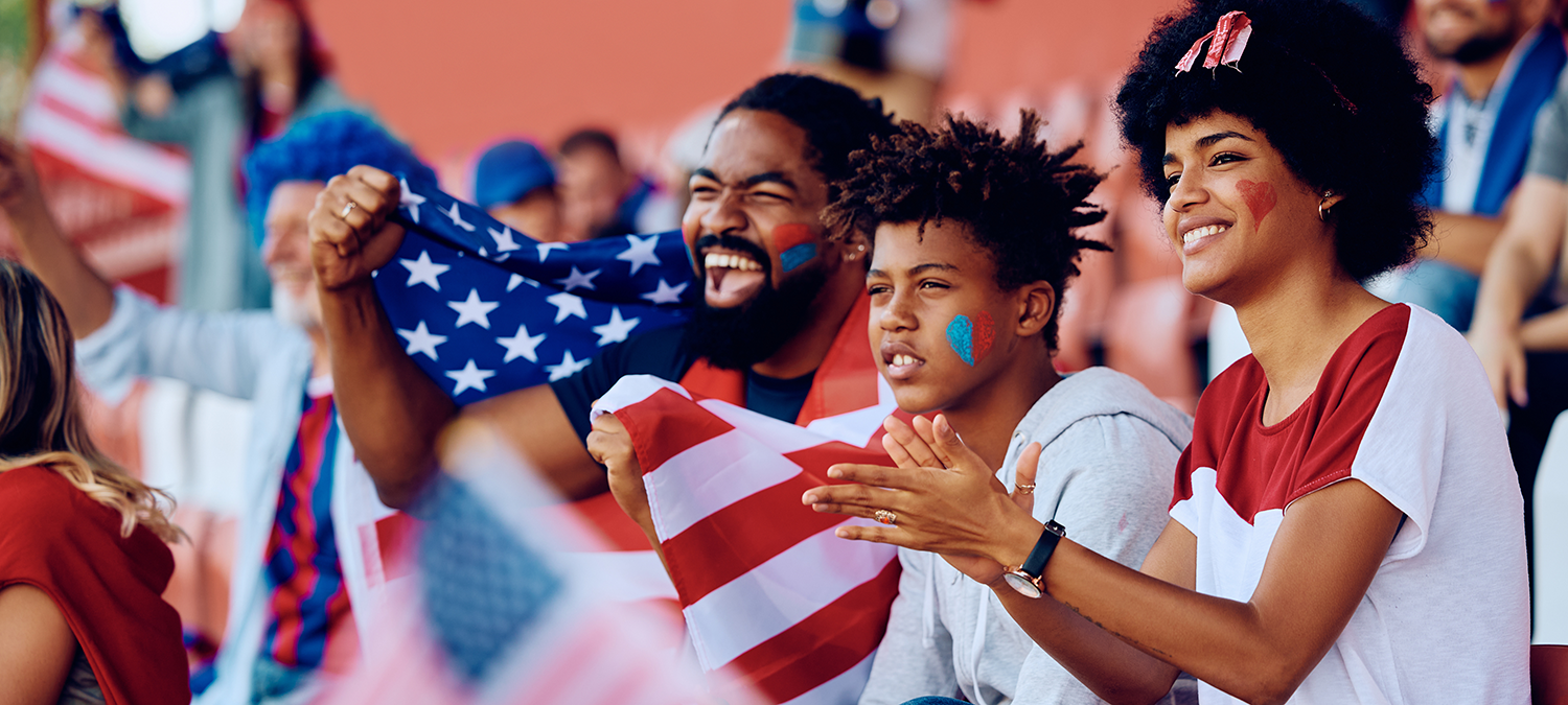 USA soccer fans celebrating while watching the World Cup